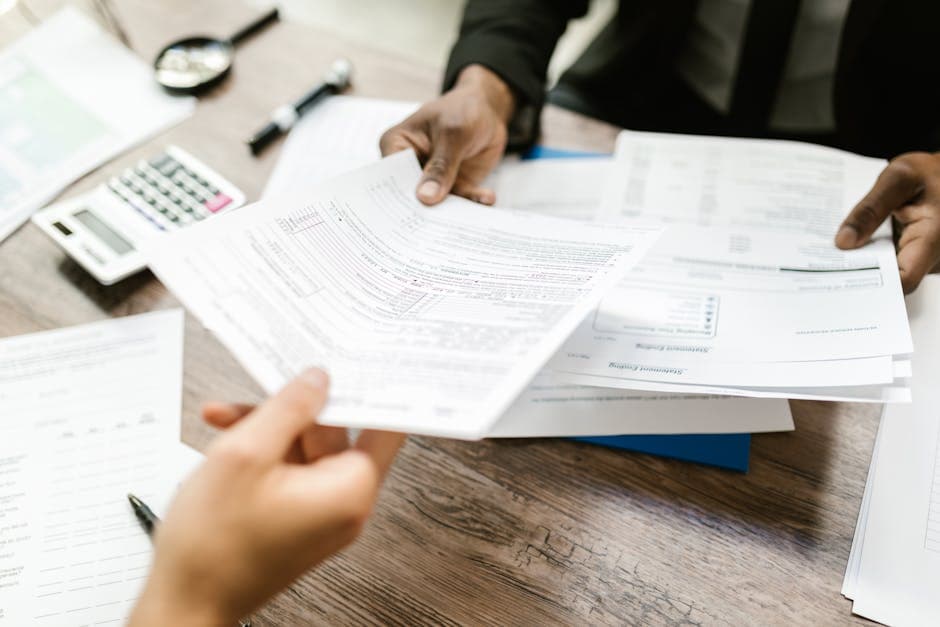 Parents reviewing a financial contract
